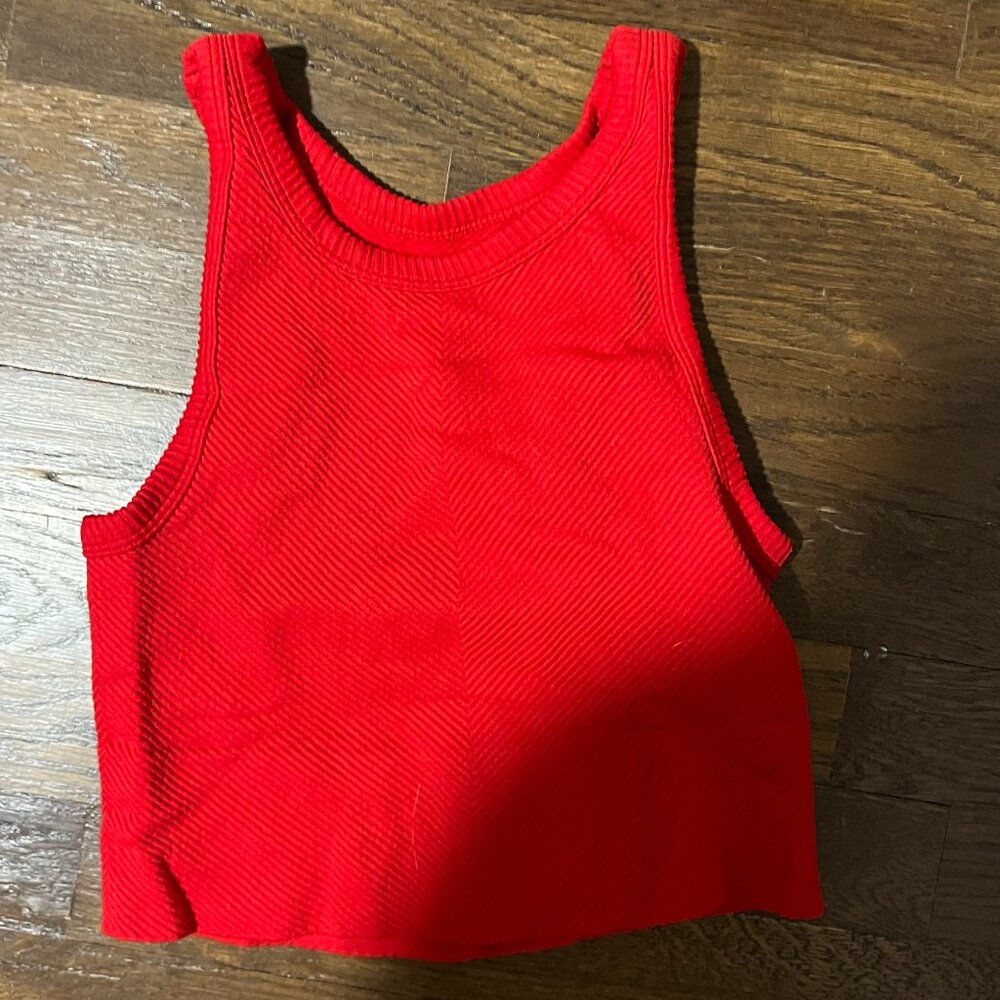 A NIKIBIKI bright red high neck tank top in the size S.